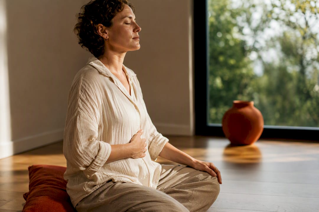 Person practicing calm counted breathing