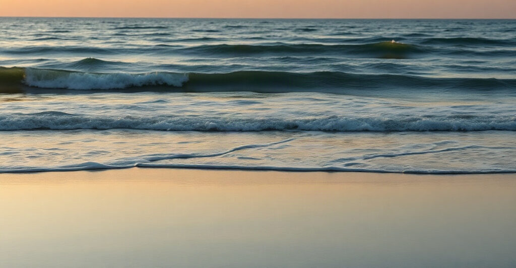 Gentle ocean waves over a steady shoreline, a metaphor for dopamine baseline and peaks
